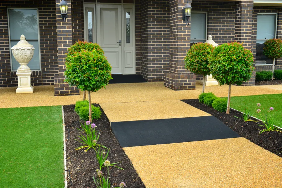 Home entry with black recycled rubber ramps in path and at door